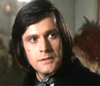 Ralph Bates as Doctor Jekyll with the lovely Martine Beswick by his side. - jek0
